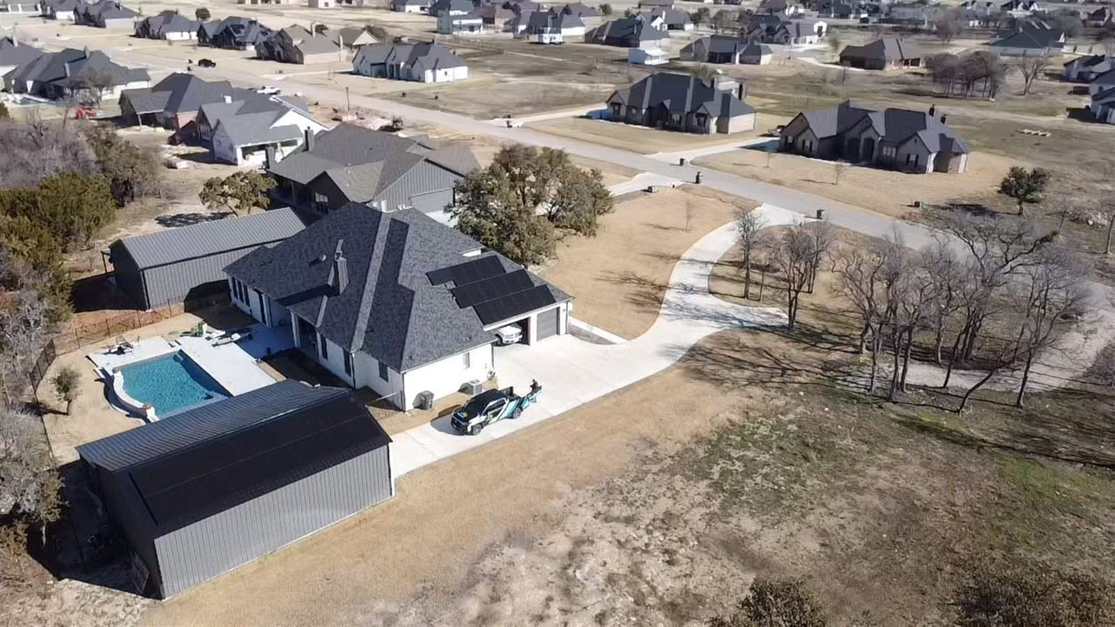 Tesla Powerwall battery unit mounted on a home wall